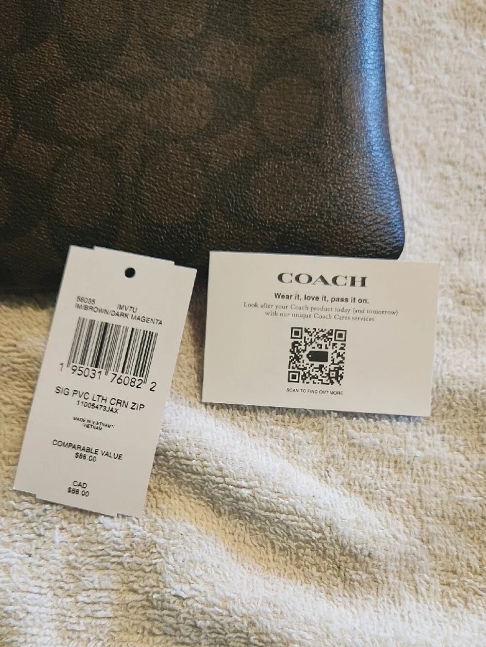 COACH Brown Signature Canvas Wristlet with Purple Center Panel